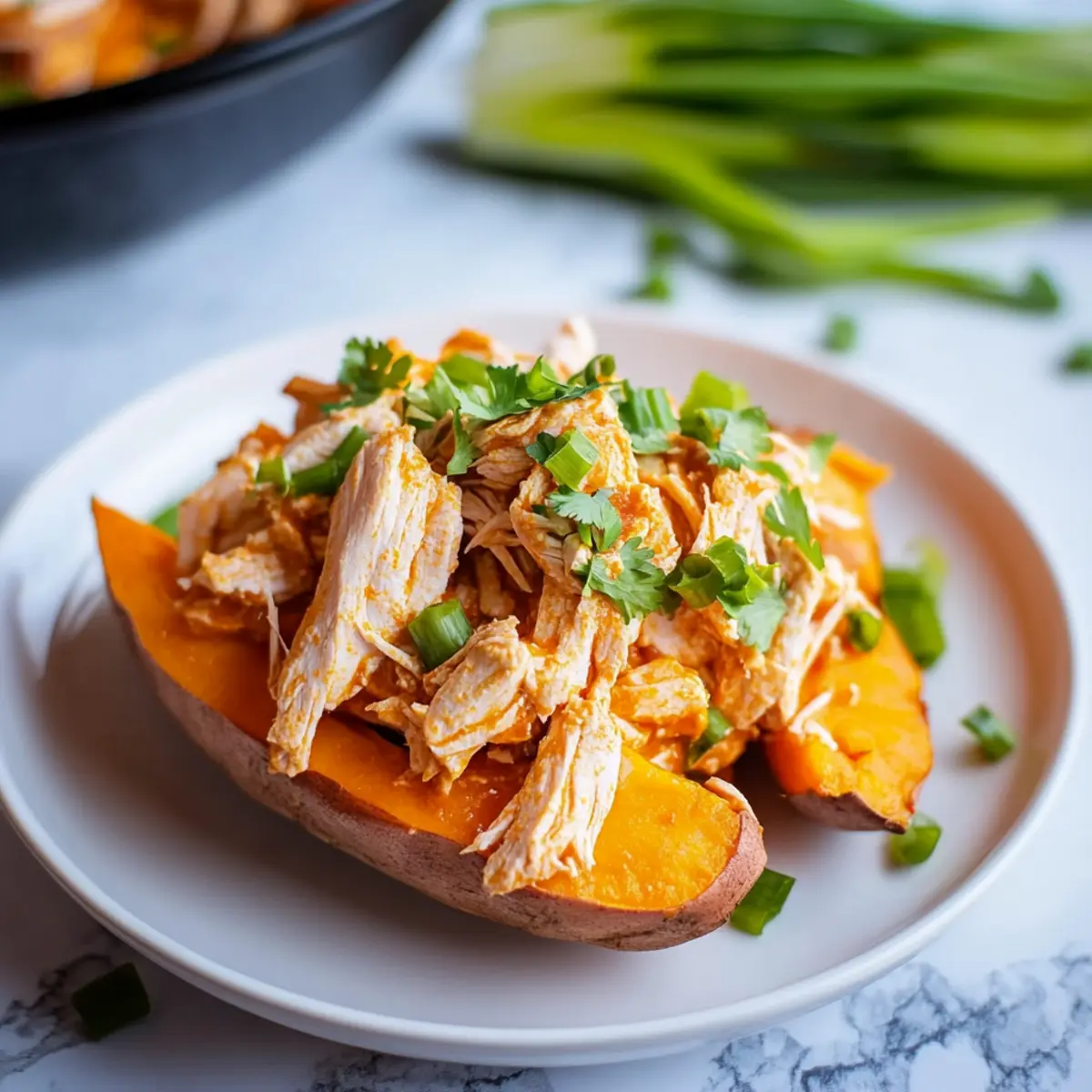 Slow Cooker Buffalo Chicken Sweet Potatoes