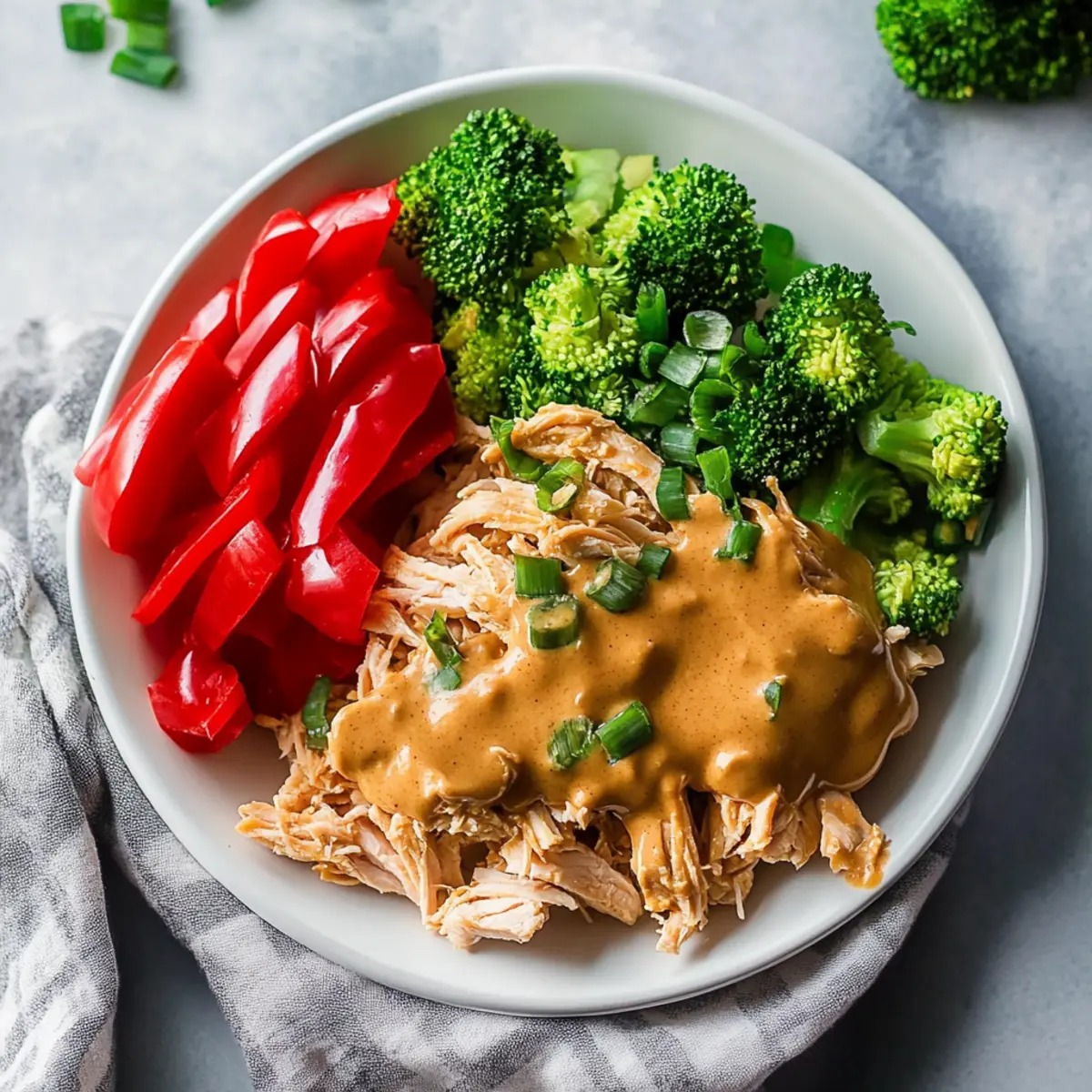 Slow Cooker Pulled Chicken with 5-Ingredient Peanut Sauce